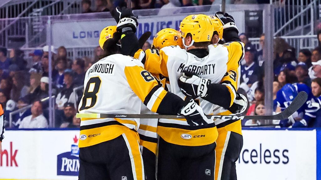 Penguins capitalize late, even series with Marlies
